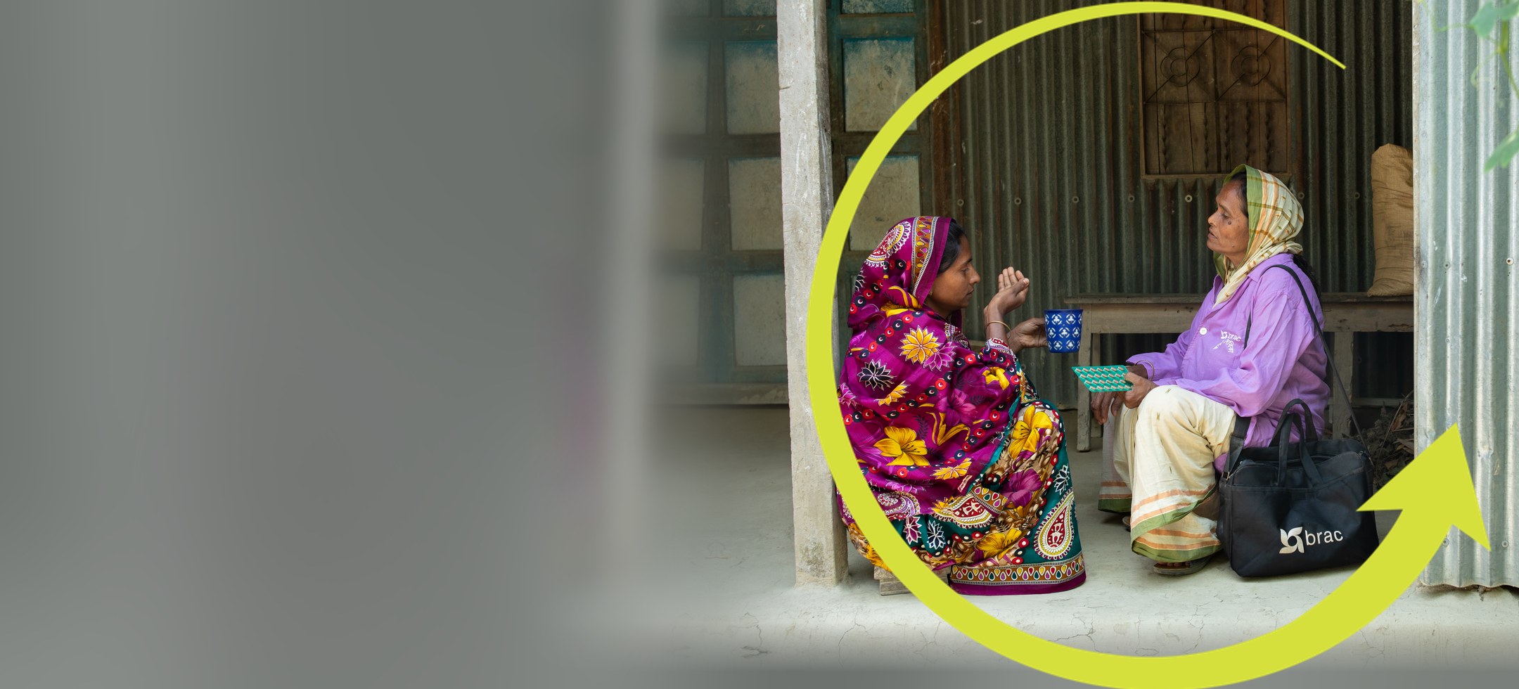 Two women talk on a veranda, one holding a mug, a BRAC bag beside them, framed by the FIF arrow