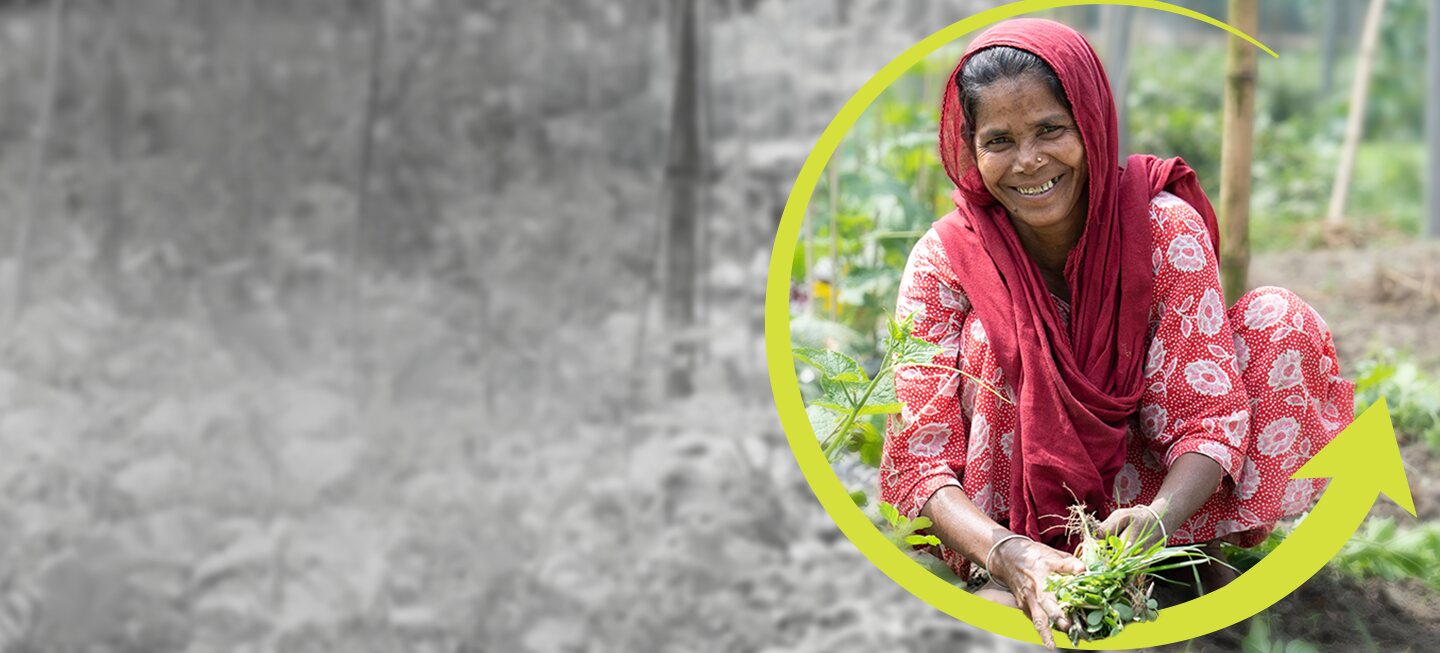 A smiling farmer in a red shawl holds freshly picked greens, framed by the FIF arrow